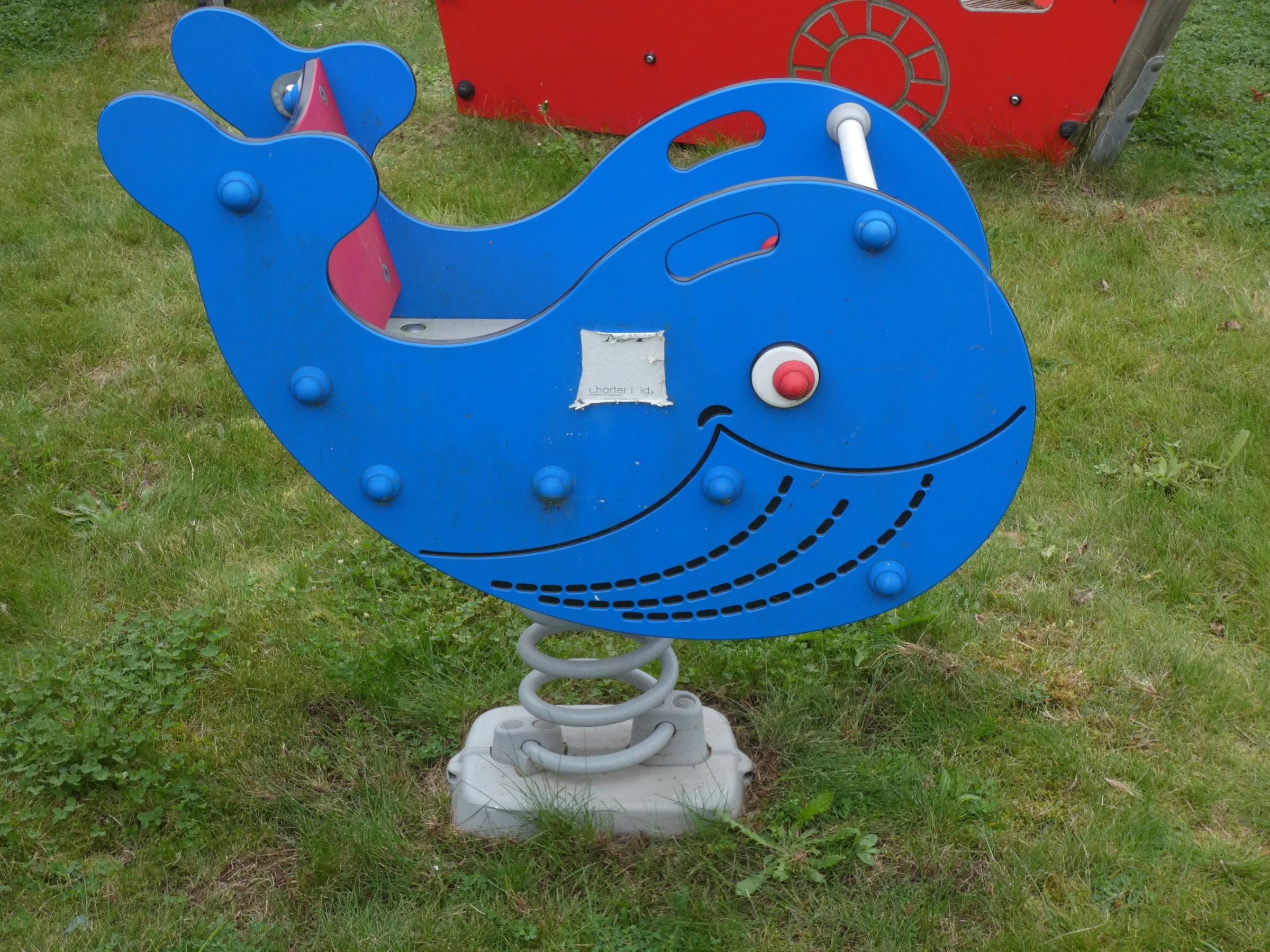 A Playdale outdoor/playground 'Springer' in the form of a whale, double-sided, made from high