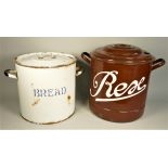 An early white enamel bread bin with lid 31cm diameter, together with a brown enamel example 35cm