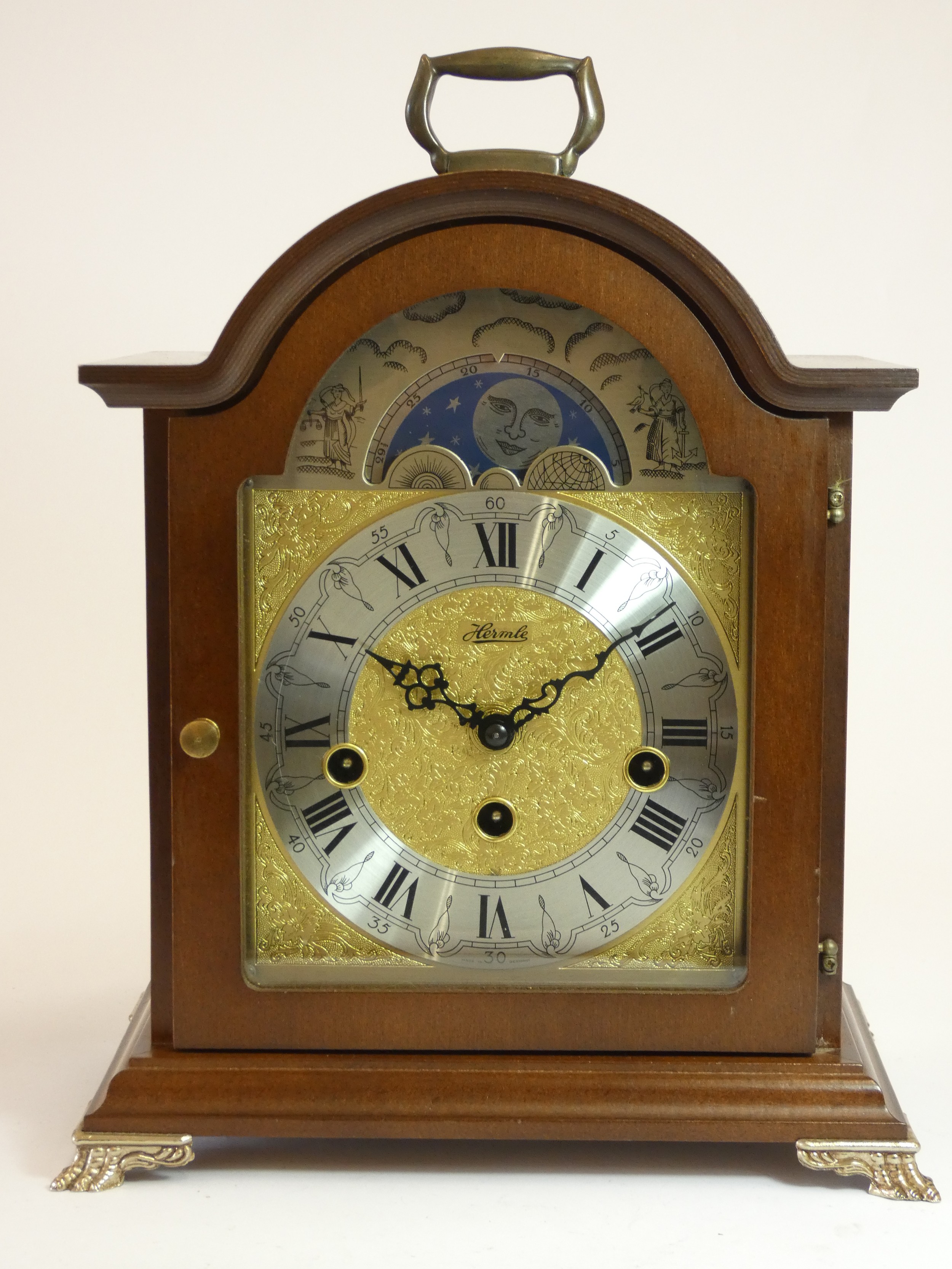 A Franz Hermie Debden bracket mantle clock, mahogany arched case, manual wind German