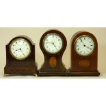 Greenwood & Sons, Leeds & Huddersfield, a mahogany and boxwood inlaid mantel clock and two other