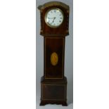 A late 19th century mahogany miniature longcase clock, white enamel 3.5 inch dial marked made in