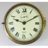 A Smiths Empire brass bulkhead clock, the 6inch dial, with subsidiary seconds dial, Roman