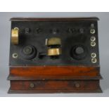 A 1920's home made radio with black enonite front panel with two 4 pin valve sockets, with