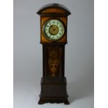 A Victorian mahogany miniature longcase clock, 3.5 inch celluloid dial, the hood and trunk with
