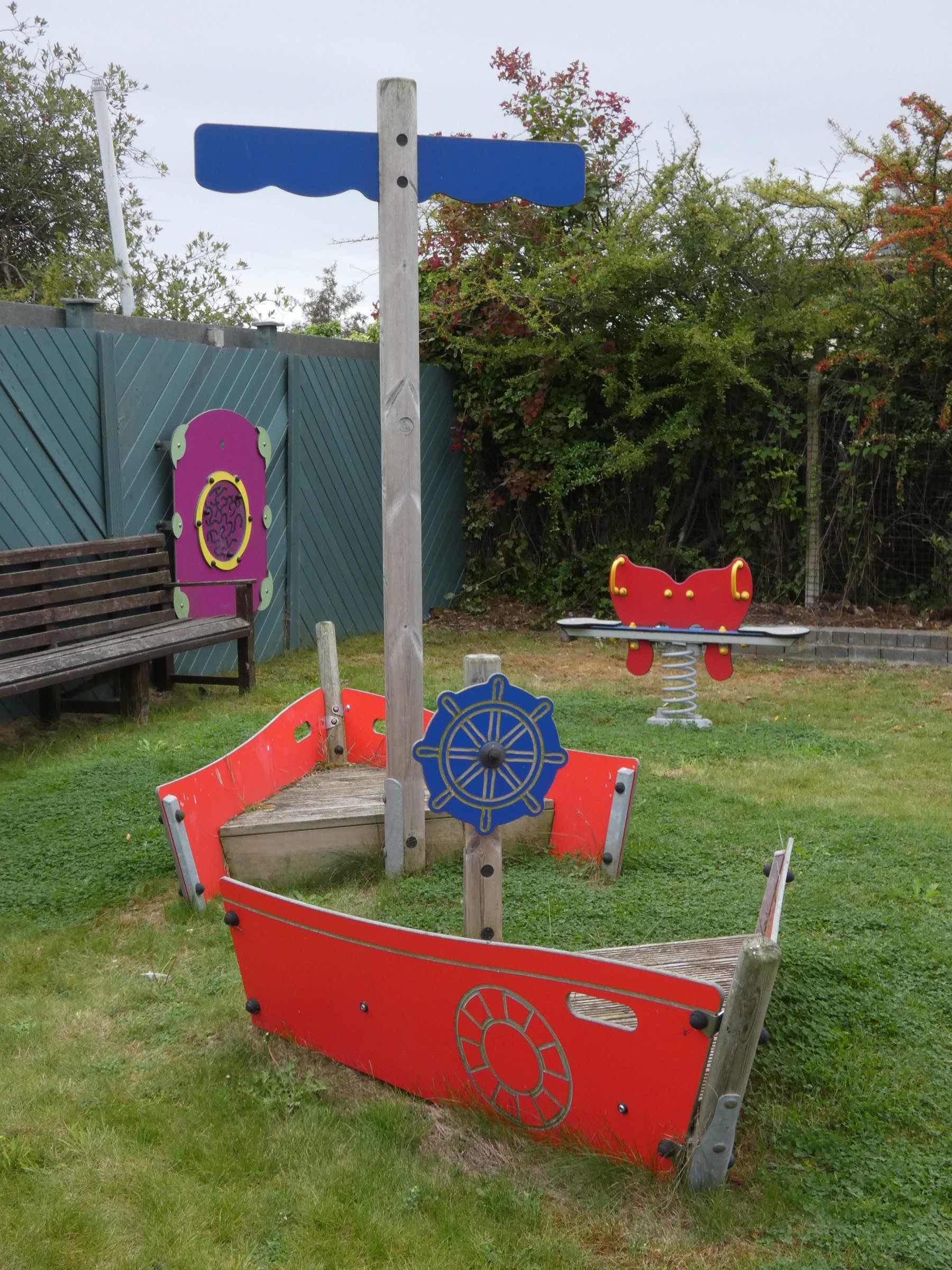 A Playdale outdoor/playground play ship, featuring themed CGL coloured panels, stern and bow seating