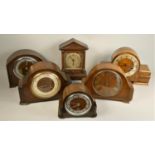 A collection of mid Century mantle clocks to include an Elliott 8 day lever Westminster chime and