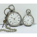 A Victorian silver open face key wind wristwatch, Chester 1894, white metal chain and a