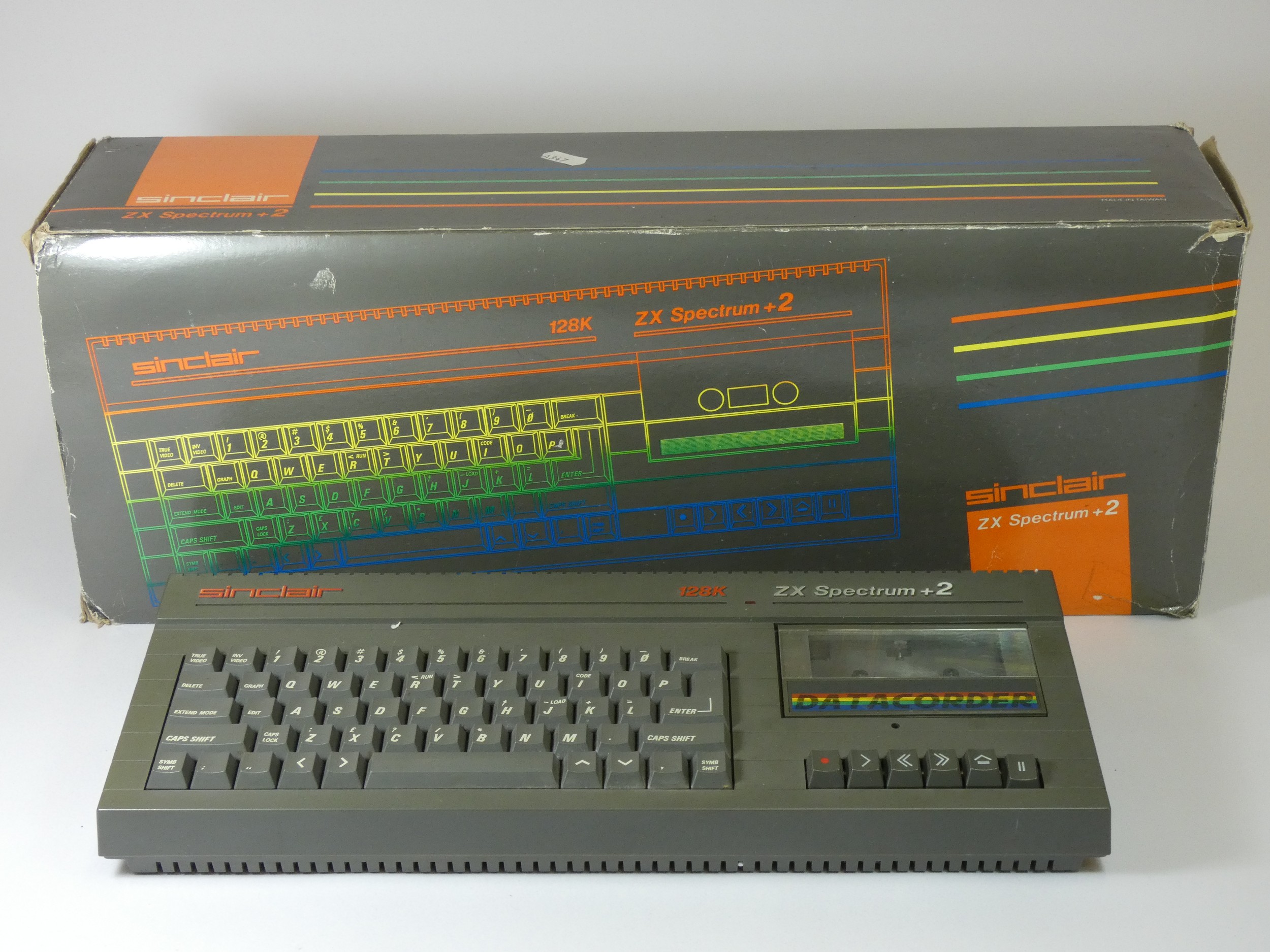 A ZX Spectrum +2, boxed with power supply and TV lead and manual, together with a Sinclair ZX81