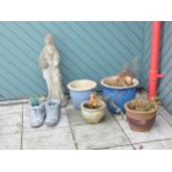 A collection of glazed garden planters together with a composition stone figurine 81cm and novelty