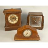 A collection of manual wind mantle clocks to include makers - Elliott and Smiths. (2)