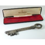 A Myon French figural cigarette gas lighter in the shape of a key, in original box.