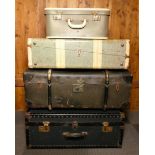 Mid Century shipping/traveling cases together with an early wood & brass bound sailor's trunk. (4)
