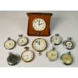 A 1920s 8 day travel clock, together with eight manual wind pocket watches.(spares/repair)