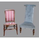A Mid Victorian high back mahogany nursing chair upholstered in pale blue chenille fabric,