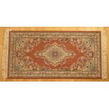 A Belgian hand knotted wool rug 180 x 90cm, together with a machine made wool rug with cream and