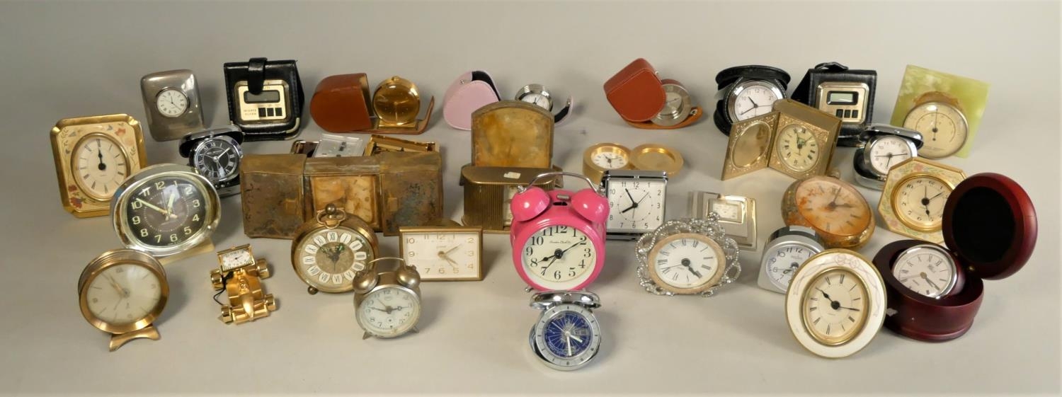A collection of travel alarm clocks together with a selection of mid Century mantle clocks & - Image 2 of 8