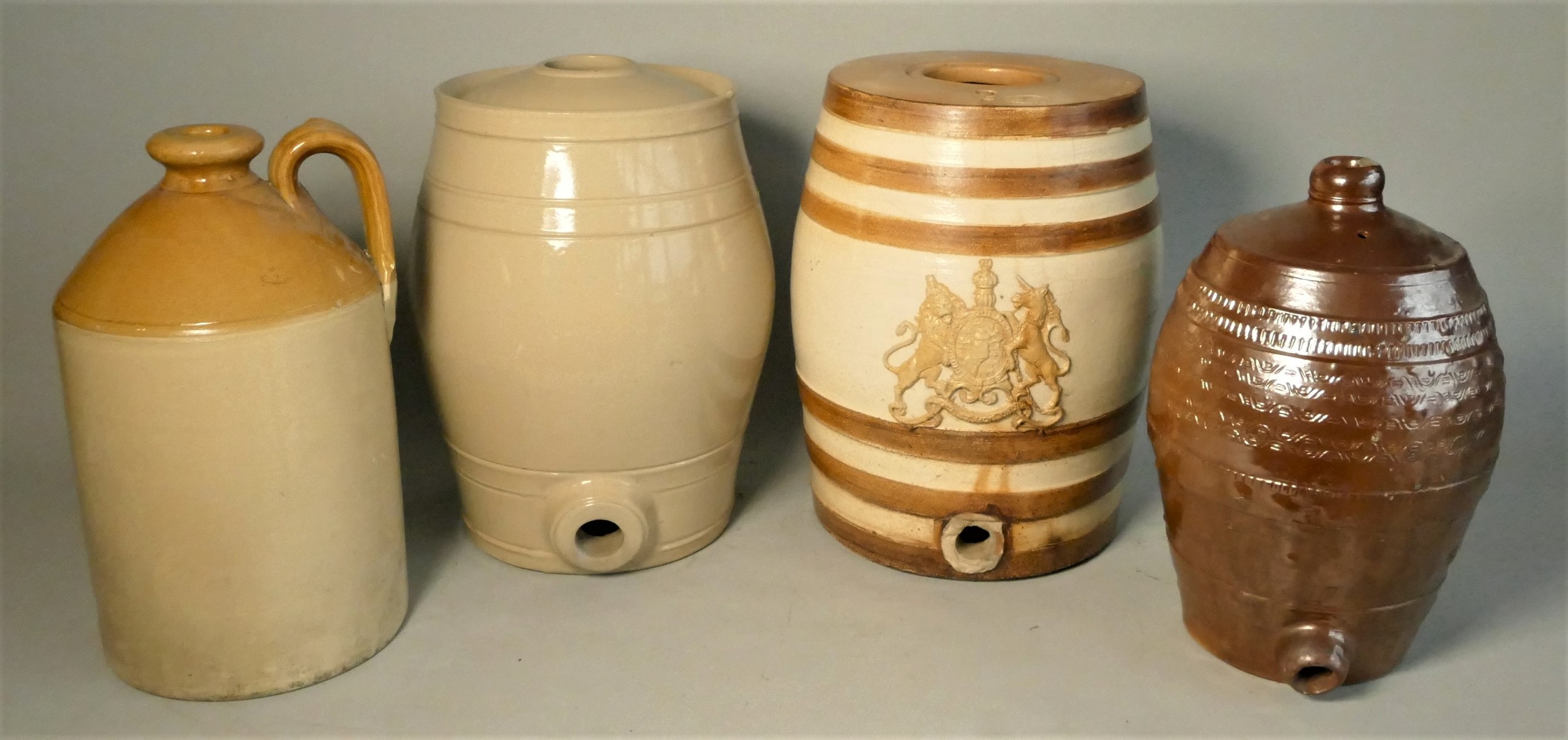 A Doulton glazed stoneware crock gin keg, royal coat of arms, two toned brown & cream, together with