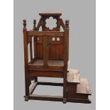 An Edwardian pitch pine Gothic style lectern.