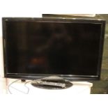 A Panasonic (TX-L37G20BA) 37inch TV, with remote control unit