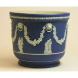 A Wedgwood blue Jasperware Jardinière Cache Pot, decorated with vines and Roman figures, height 20cm