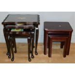 A carved inlaid nest of three tables together with two side cabinets and a dresser display