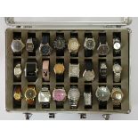 A collection of twenty four quartz ladies and gents wristwatches, makers to include Timex, Casio,