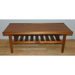 A Mid-Century solid teak coffee table, with slated under shelf, height 45cm, length 110cm
