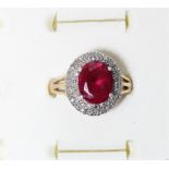 A silver gilt, red and white stone cluster ring, O