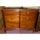 A mid Century chest of drawers with two sets of three graduated drawers. W107cm, D51cm, H87cm,