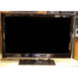 A Samsung (UE40B7000WW) 40 inch HD 1080p TV, with Dolby digital plus (no remote control unit)