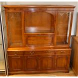 A honey yew wood display dresser, together with a matching yew wood fold over games table, a TV/HI-