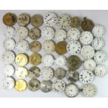 A collection of pocket watch movements and dials