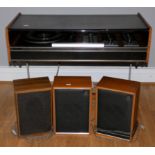 A Decca Sound Compact 3 entertainment system, with turntable and radio, teak cabinet on metal