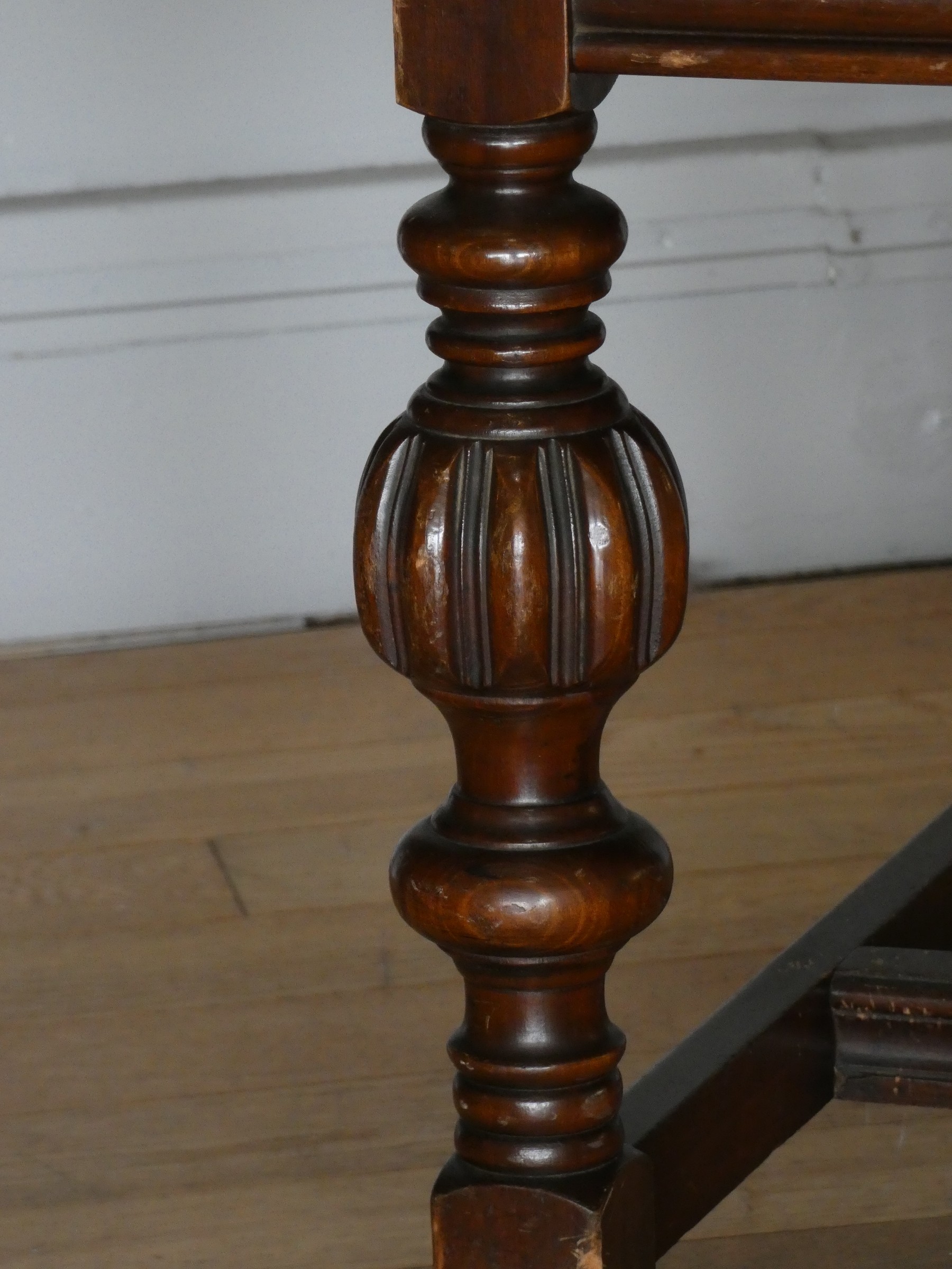 A Jacobean style oak draw leaf dining table raised on turned uprights supported by carved - Image 6 of 10