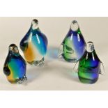 A collection of four limited edition coloured glass penguin paperweights (boxed), no. 1273/1500,