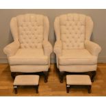 A pair of modern Queen Anne style winged, high back armchairs, upholstered in a patterned cream