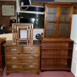 A mid Century oak chest of drawers, together with an oak nest of three tables, a freestanding open