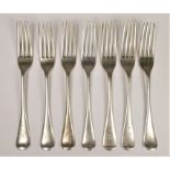 A silver set of seven Old English pattern dessert forks, Sheffield 1903 (5) and 1923 (2), initialed,