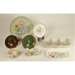 A collection of Poole pottery to include a hand painted floral plate, 23cm diameter, a Hors D'oeuvre