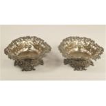 A Victorian silver pair of heart shape dishes, London 1895, pierced decoration raised on a cast