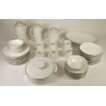 A 59 piece German white with silver rim dinner and tea service