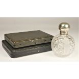 A cut glass and silver mounted scent bottle, Birmingham 1910 with pull off cover, a silver set of