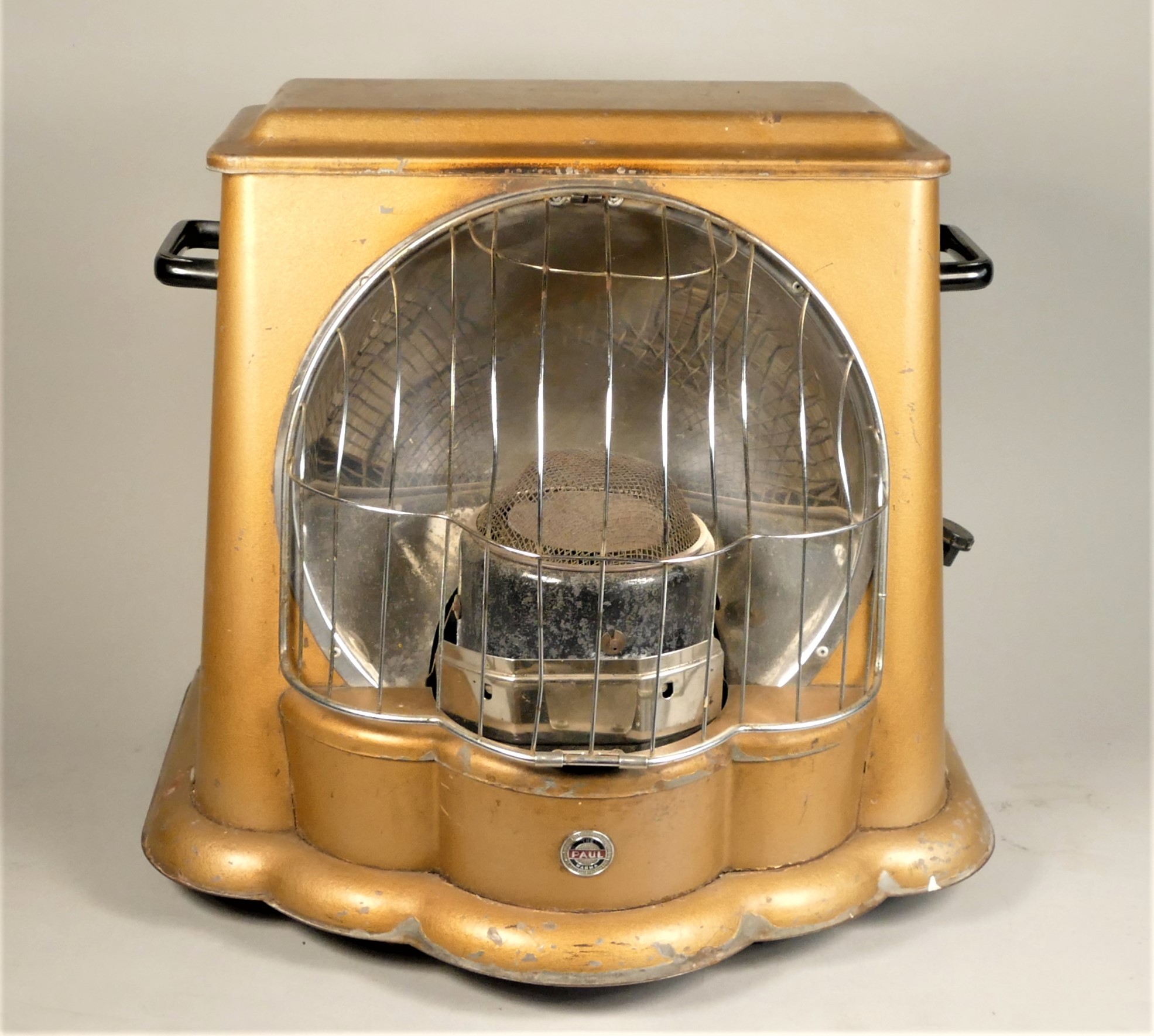 A 1950s Art Deco style paraffin heater by Paul Warma, original and complete with instructions.