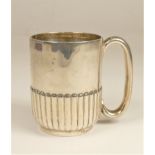 A Victorian silver christening mug, London 1901, with fluted lower body, 144 gm