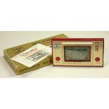 A Nintendo Game and Watch (Octopus) single/wide screen handheld game c.1981 (serial number 21664833)