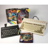 A ZX Spectrum, together with a Commodore A600, manuals for ZX Spectrum+3 and Commodore, Techno Sound