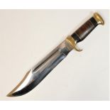 A Down Under The Outback hunting knife, 27cm blade, brass guard and pommel, ebony and leather