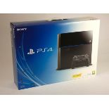 A Sony Playstation 4 console, in original box with controller and headset (Power and HDMI cables are