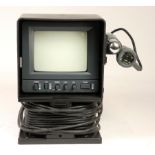 An unbranded CCTV Monitor and Camera, with detachable LED camera, 5ft cable, in a moulded
