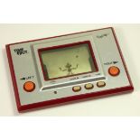 A Nintendo Time Out (Toss-up) handheld game c.1980 (serial number 00030807) Time out was the first